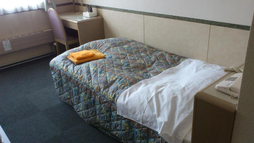 Business Hotel Motonakano Tomakomai Quarto foto